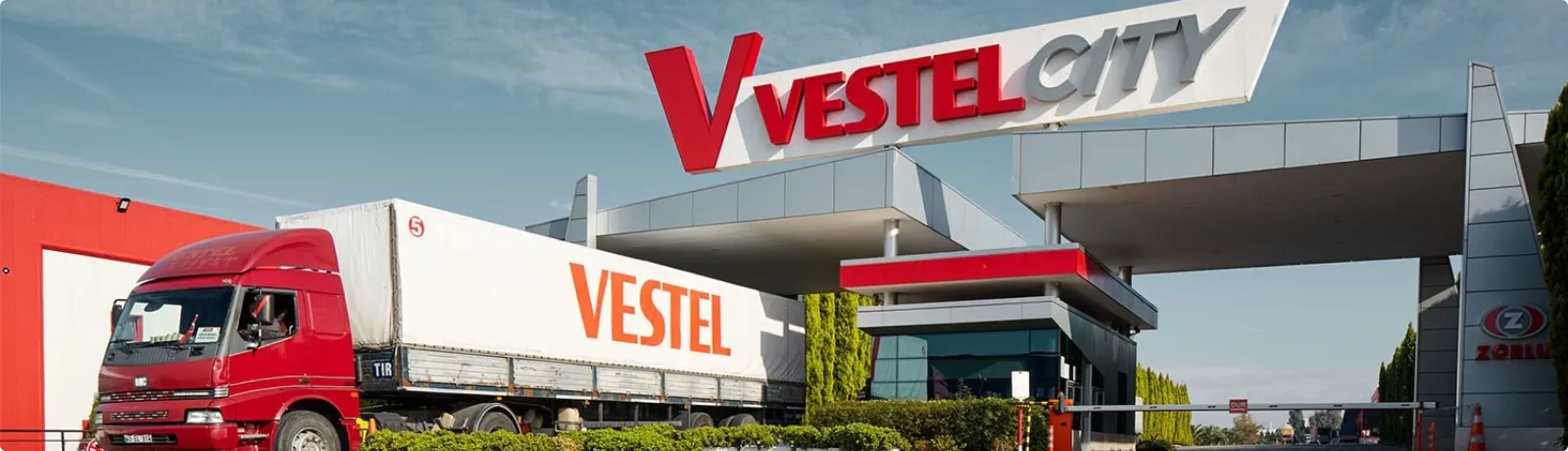 Vestel logistics truck at factory gate representing streamlined production and delivery network