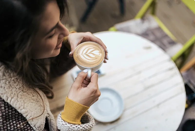 Woman is enjoying her coffee