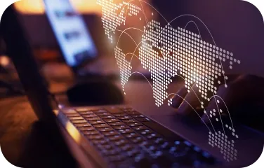 Laptop screen showing a digital map and data connections of a global supply network.