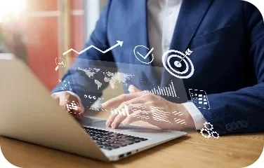 Businessman typing on a laptop with financial planning icons