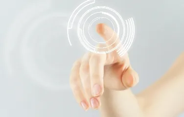 Finger touching digital circular interface on white background
