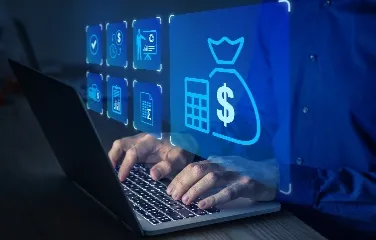 Person using laptop with digital finance icons