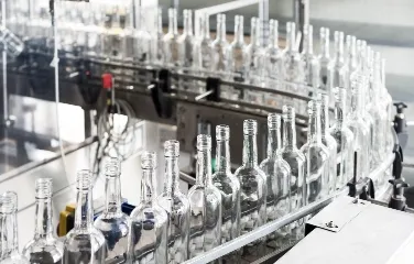 Automated bottling line in a manufacturing facility