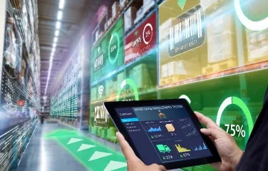 Person using digital tablet to monitor smart warehouse performance dashboards