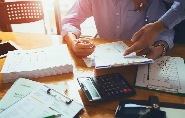 Team analyzing financial data and planning strategies