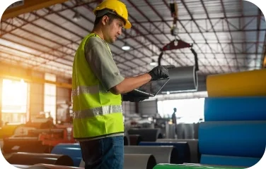 Warehouse worker scanning boxes with a handheld device