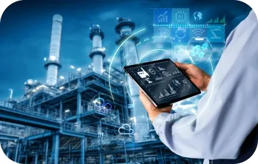 An engineer uses a tablet to review real-time production data and control dashboards at a chemical plant.