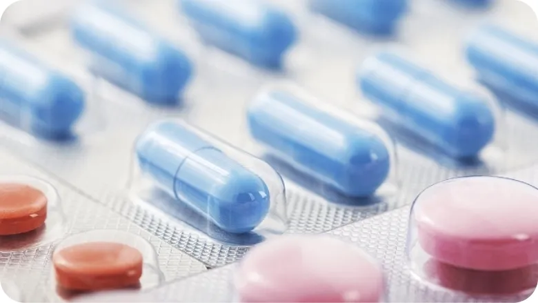 Customer story showcasing supply chain optimization in the
pharmaceutical industry with pills and capsules.