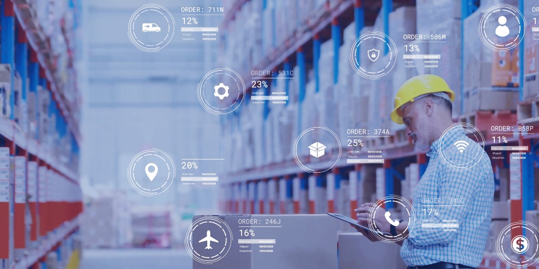 Supply chain manager using tablet with digital dashboards to optimize S&OP and improve planning efficiency