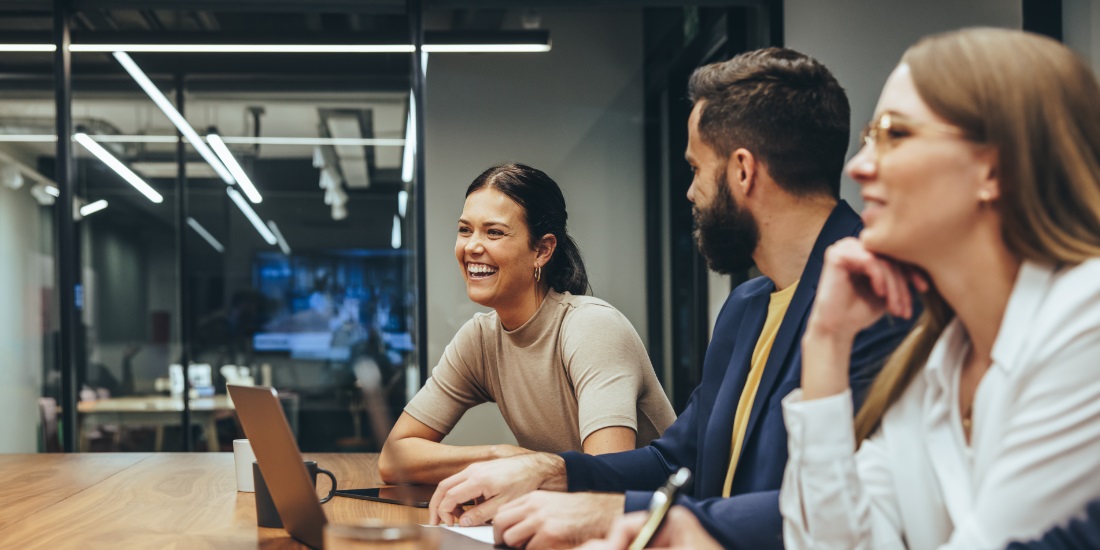 Sales and operations teams collaborating in a modern office to improve S&OP alignment and performance