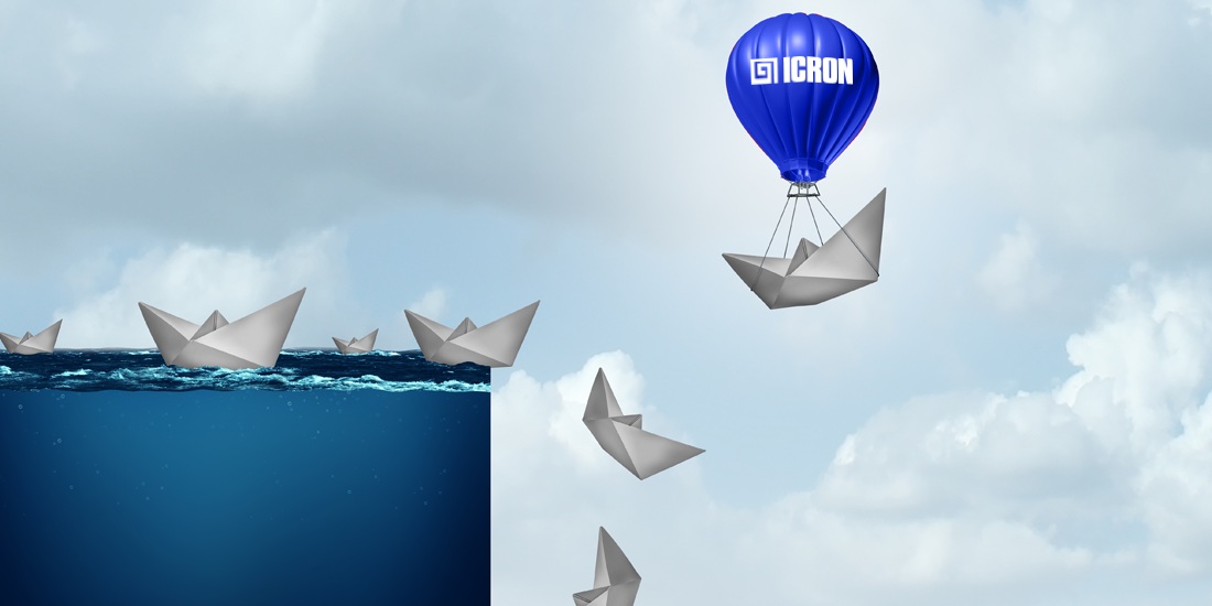Paper boats with one lifted by ICRON balloon symbolizing innovation and competitive advantage in supply chain