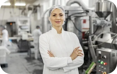 A production worker in a pharmaceutical facility supports batch production scheduling.