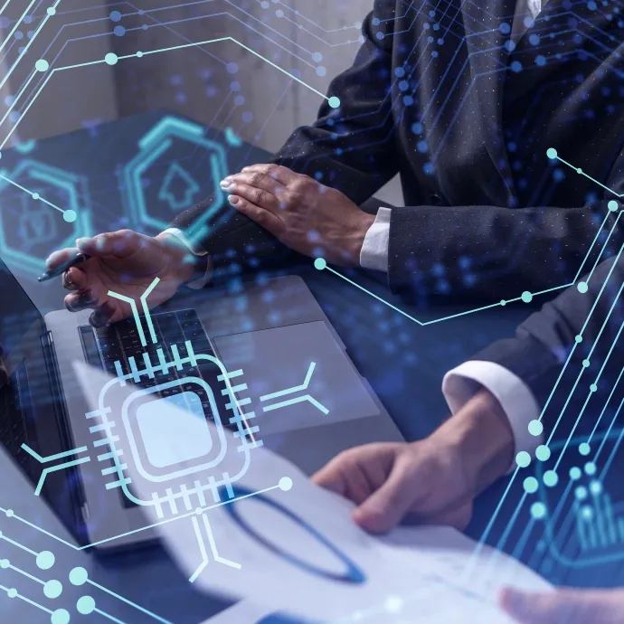 Business professionals analyzing semiconductor and technology data with AI and digital network overlay